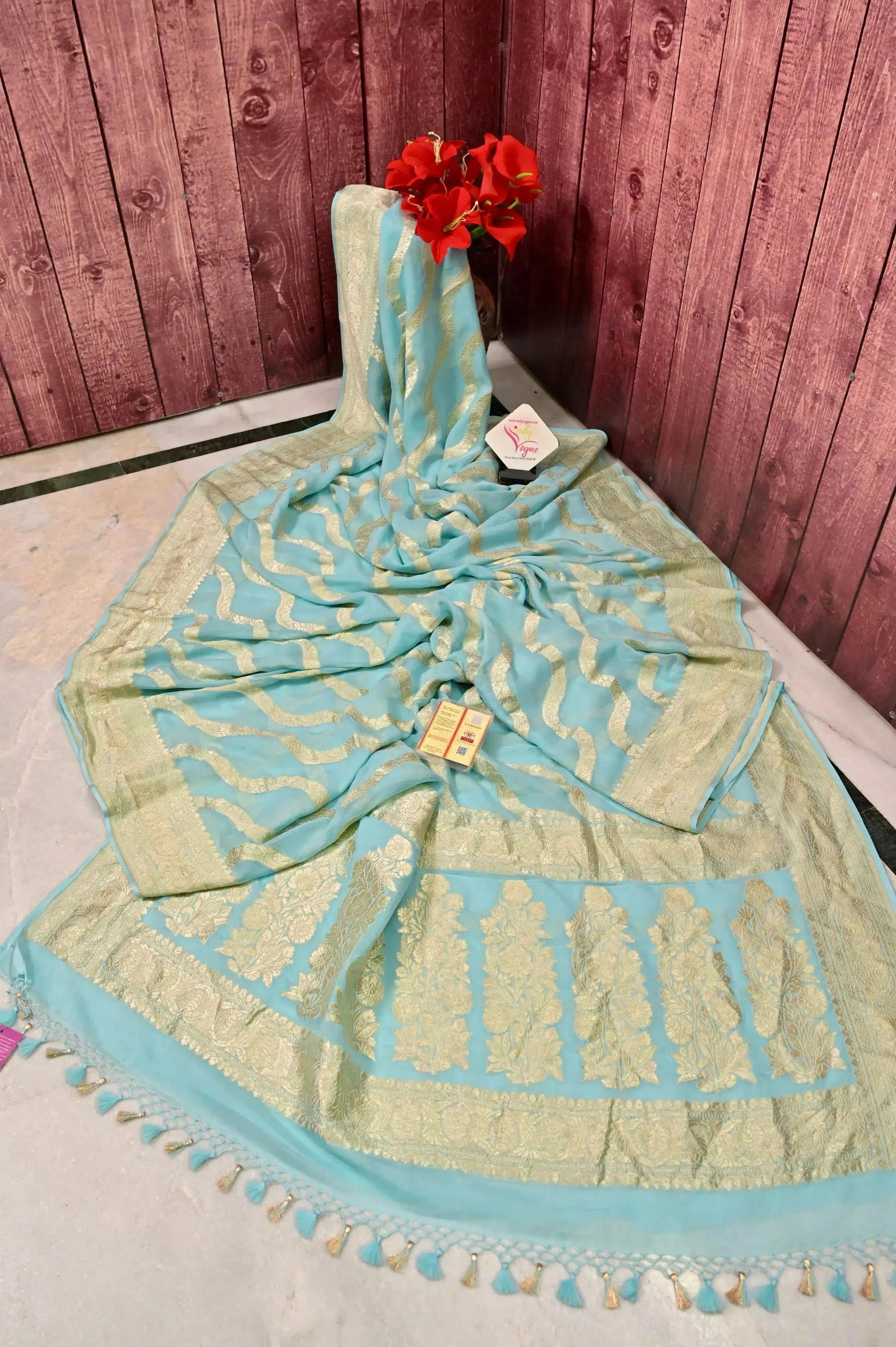 Light Blue Color Pure Georgette Banarasi Saree with Leheriya Pattern Zari Work
