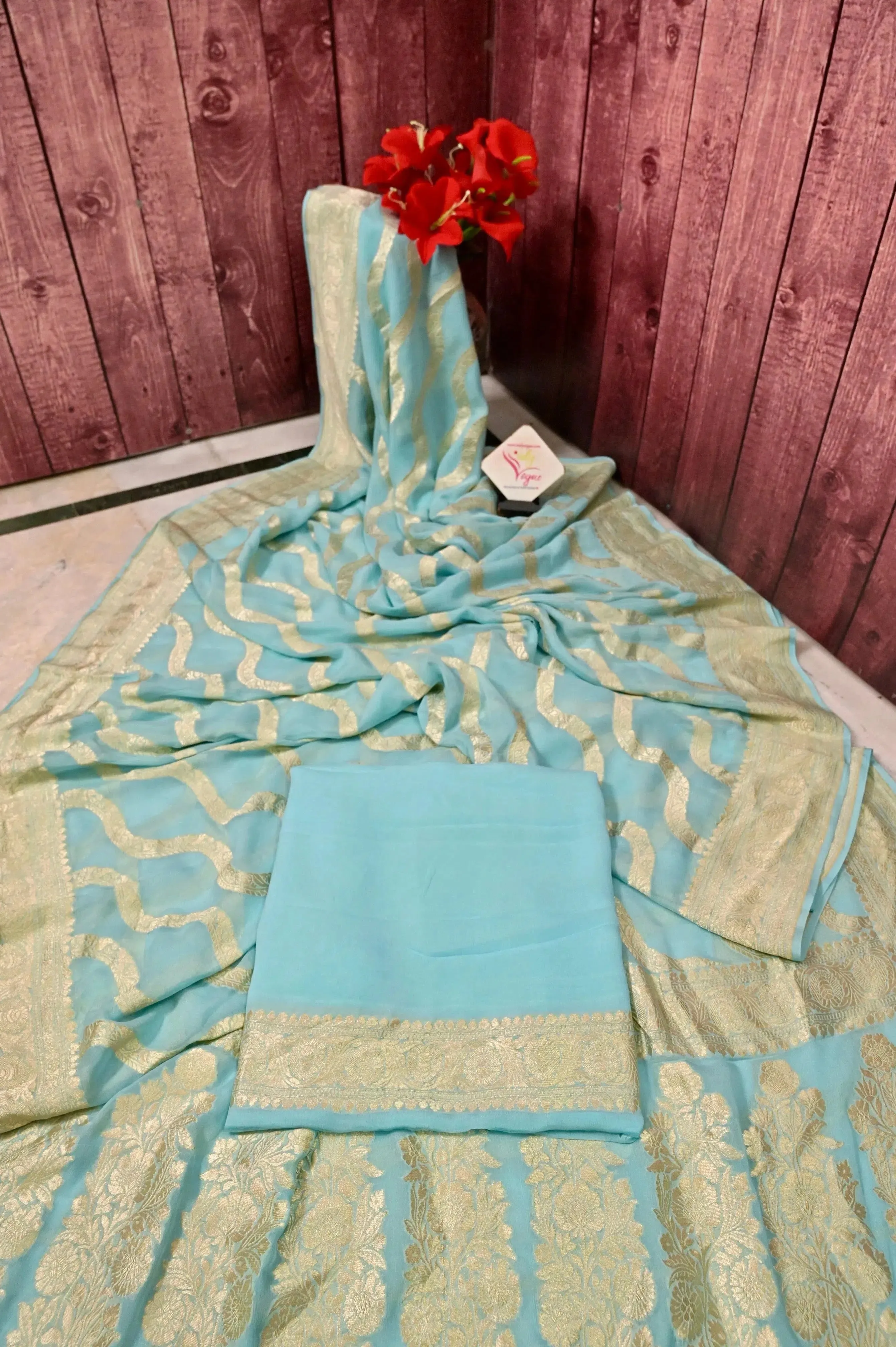 Light Blue Color Pure Georgette Banarasi Saree with Leheriya Pattern Zari Work