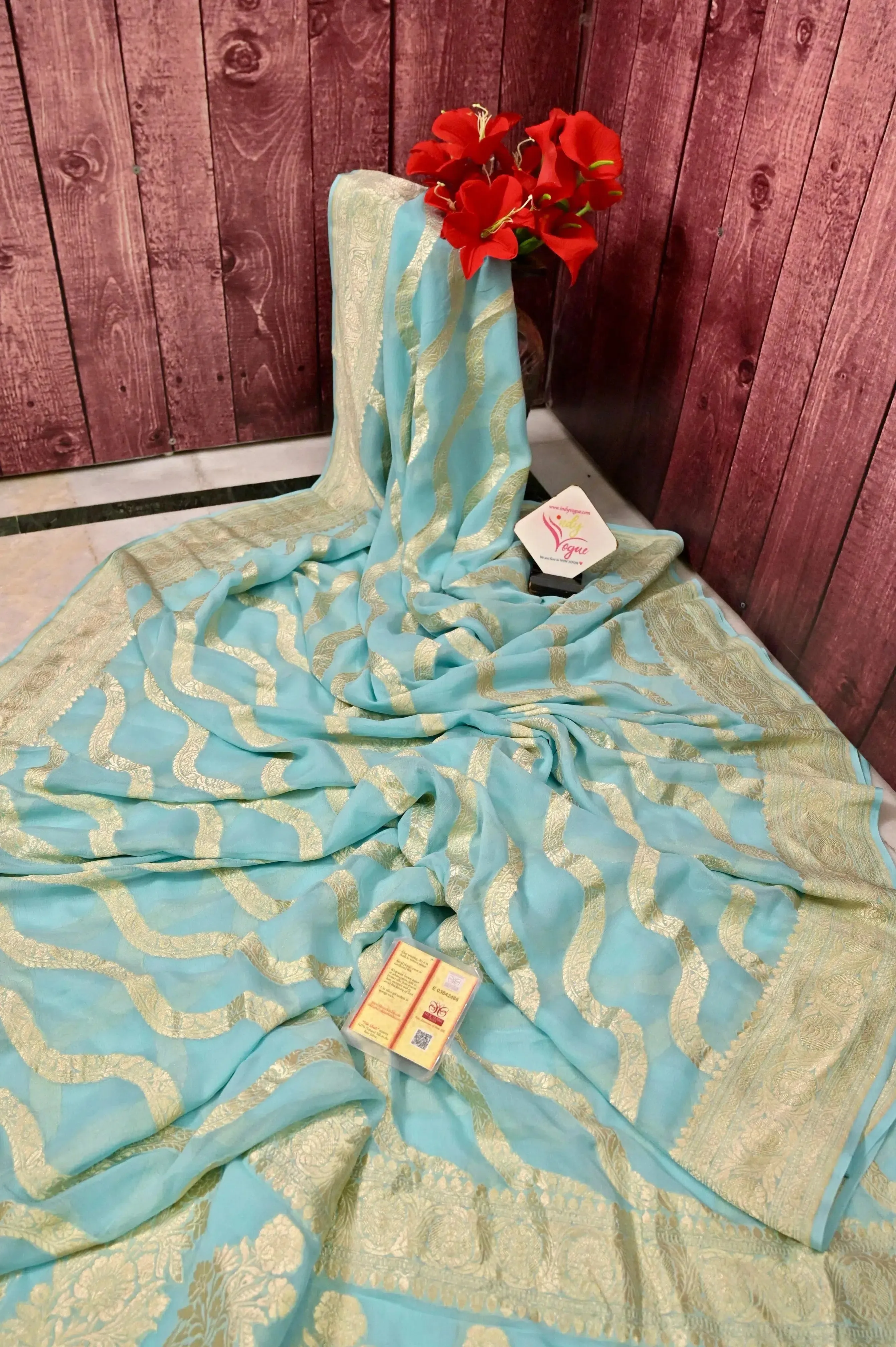 Light Blue Color Pure Georgette Banarasi Saree with Leheriya Pattern Zari Work